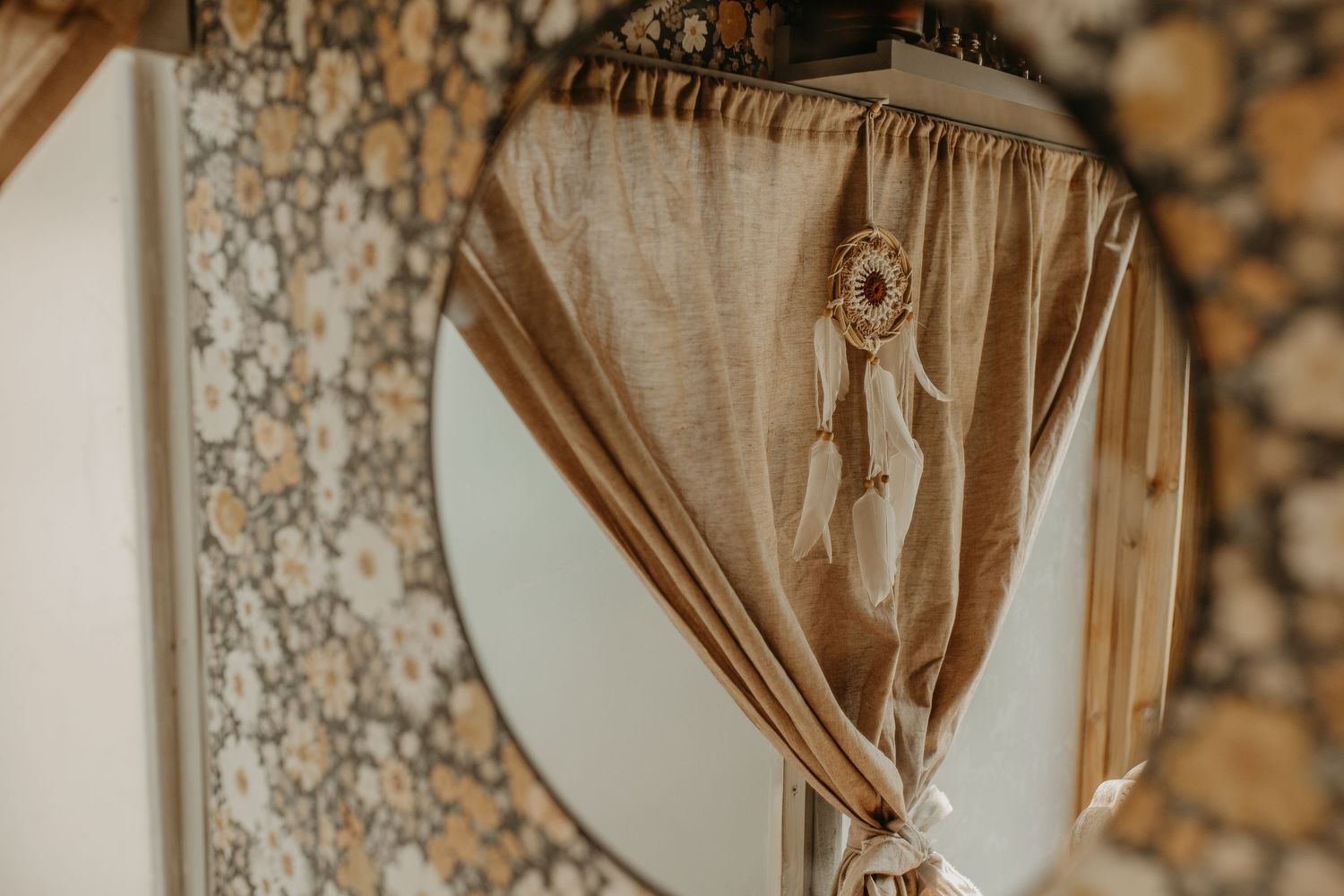 White and gold customizable banner draped elegantly across an ornate floral-patterned wall for event decoration.