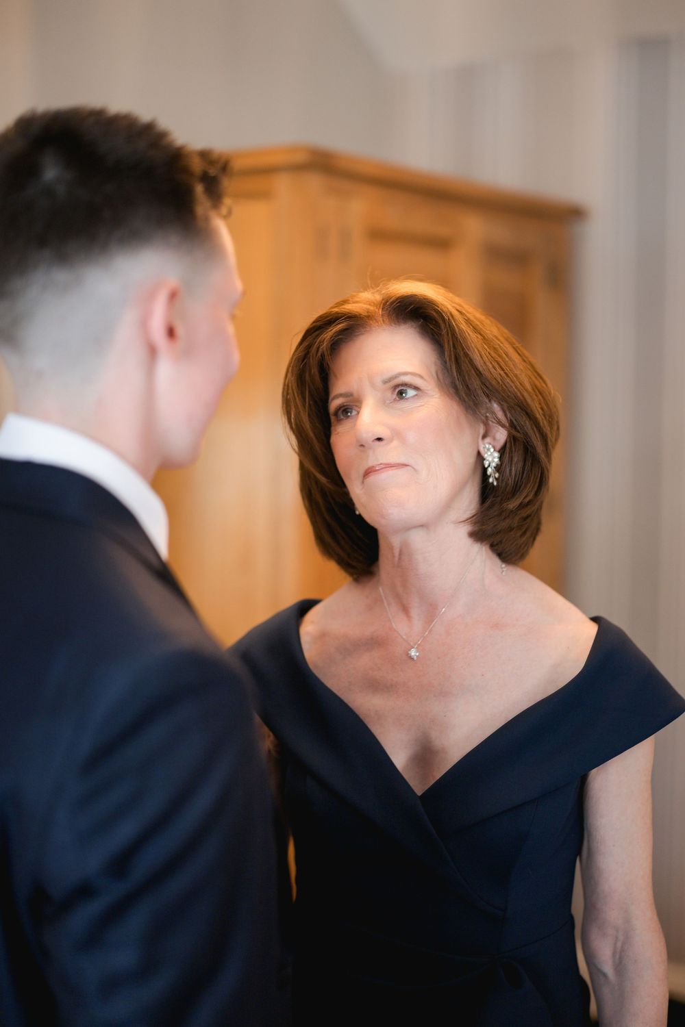 A series of candid moments captured during a formal event showing elegant interactions.