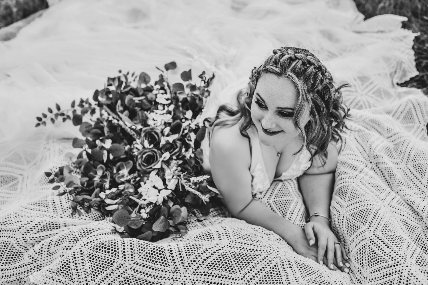 Golden hour bridal portrait of blonde bride in embroidered veil with vintage shoes in Corinth, Texas.