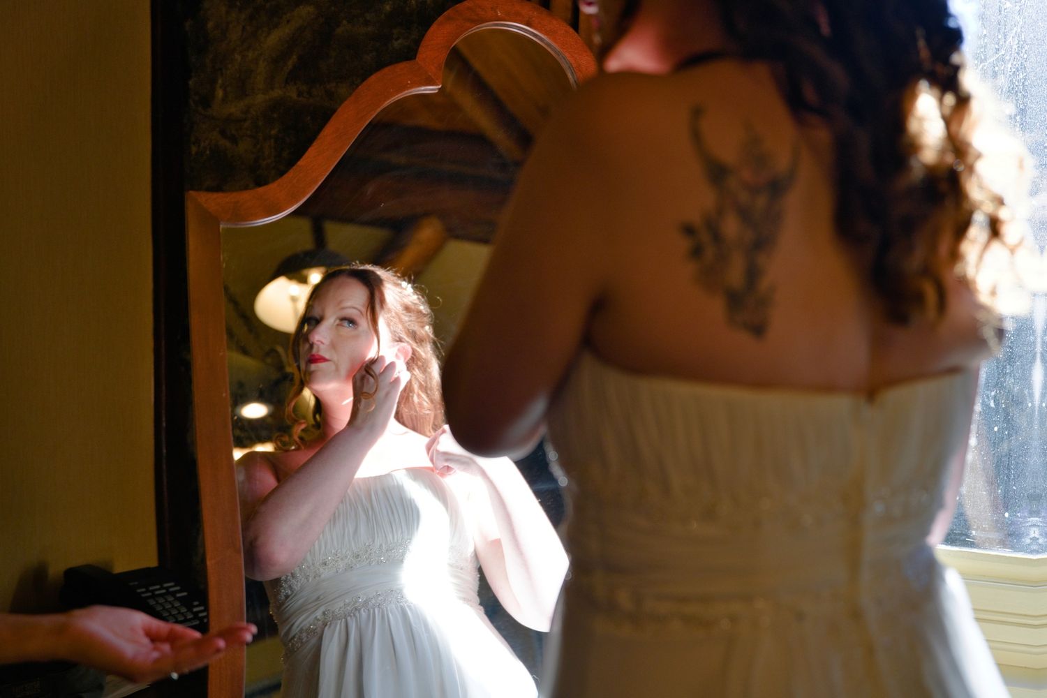 Inside view of formal event space with warm ambient lighting and intimate atmosphere.