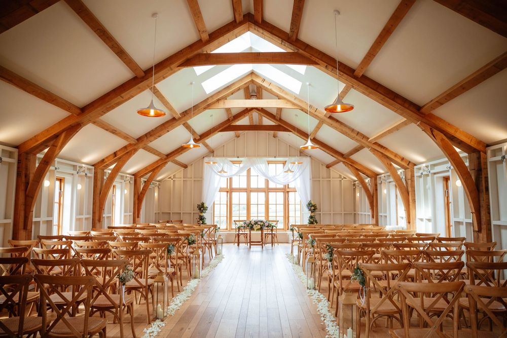 Hyde House Wedding Photographer Cotswolds Zara Davis Photography Gloucestershire Cheltenham overview of inside ceremony space barn March