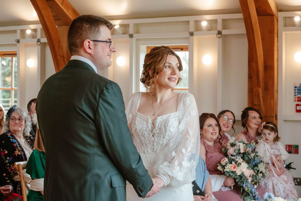 Hyde House Wedding Photographer Cotswolds Zara Davis Photography Gloucestershire Cheltenham bride and groom ceremony side on
