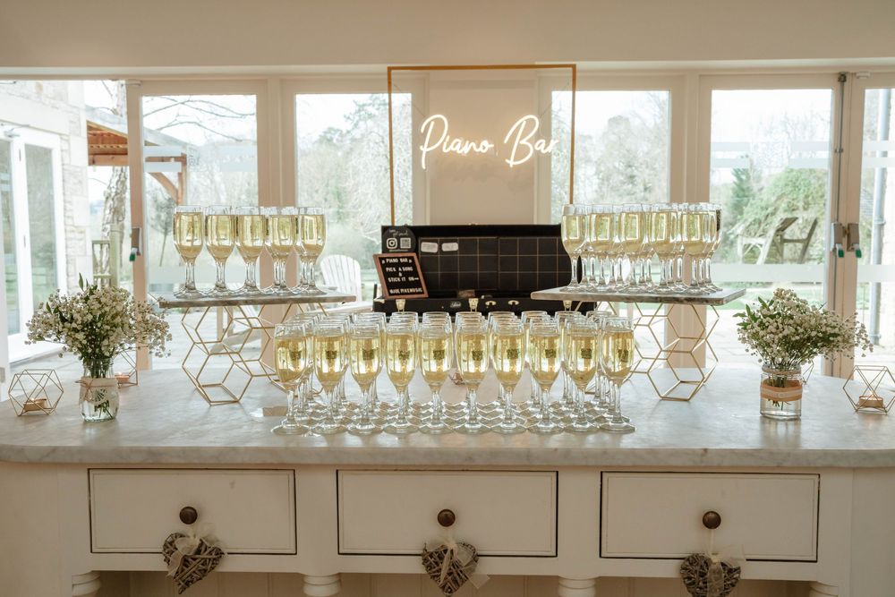 Hyde House Wedding Photographer Cotswolds Zara Davis Photography Gloucestershire Cheltenham drinks reception prosecco glasses