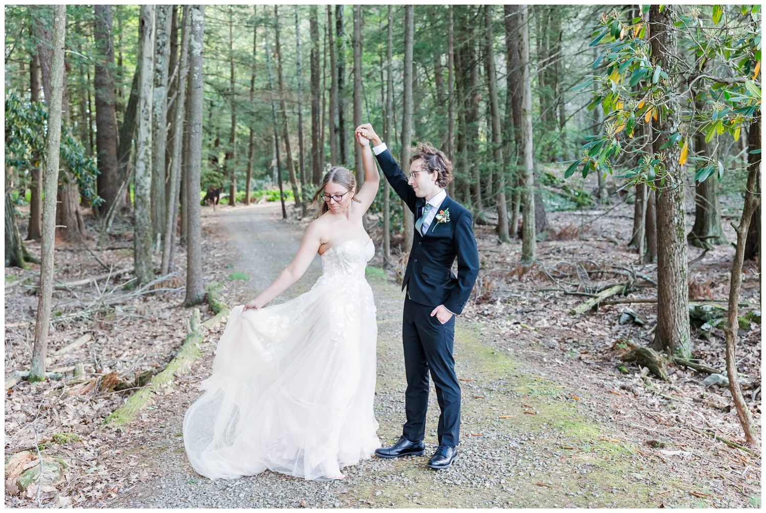 Series of romantic wedding photos taken on a wooded forest path surrounded by tall trees.