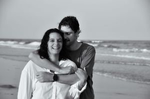 Couple poses during an outdoor couples photography session.