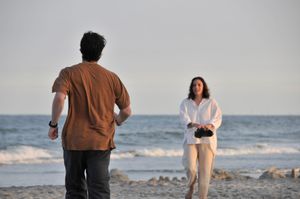 Candid photo during an outdoor couples photography session.