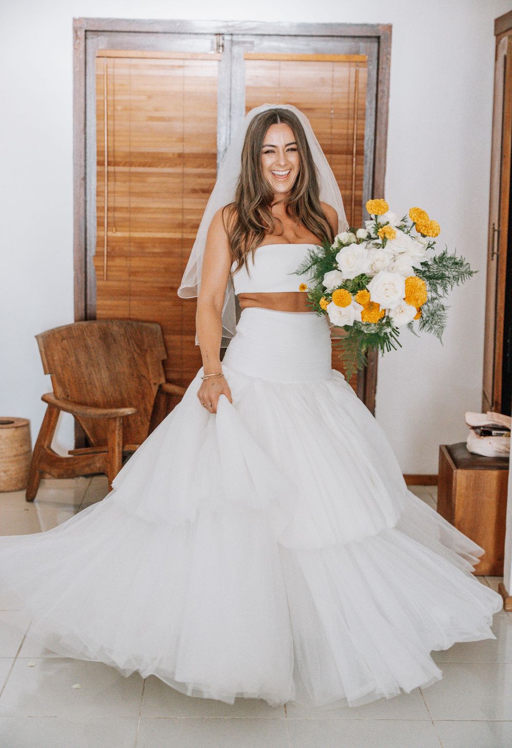 A bride in a flowing white wedding gown twirls and dances joyfully through multiple flowing moments captured in elegant frames.