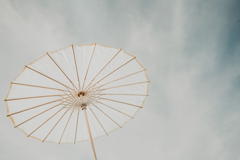Artistic and minimalist shot of a wedding umbrella