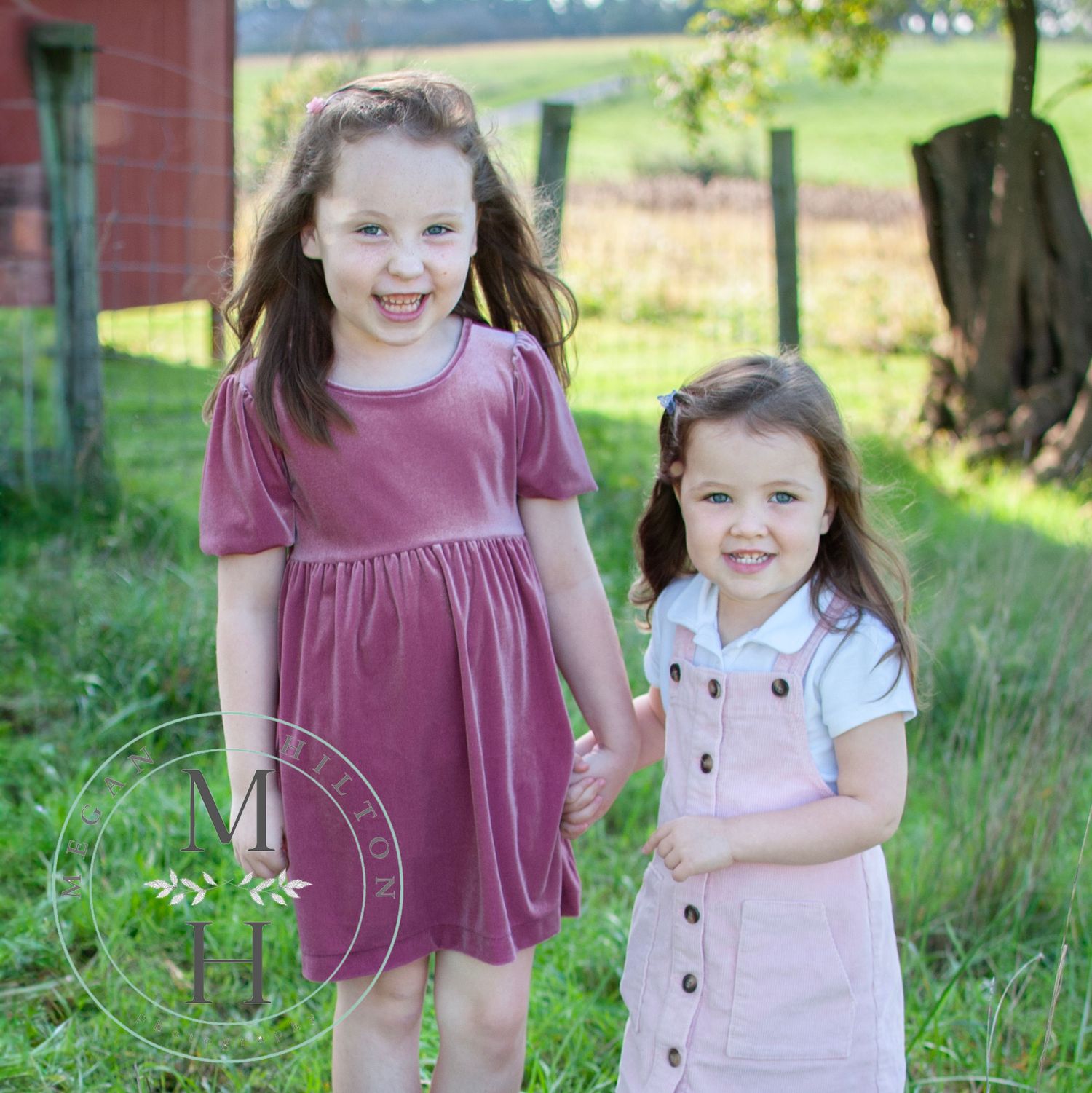 Standing pose of two sisters photo together
