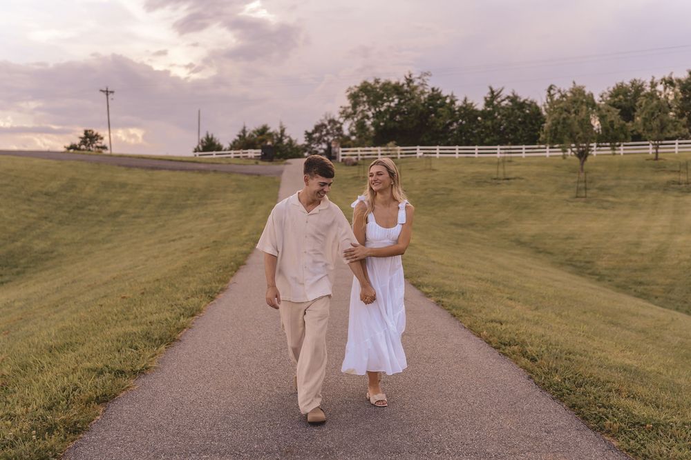 Engaged couple walking together at Willow and Stone Events in Mocksville, North Carolina