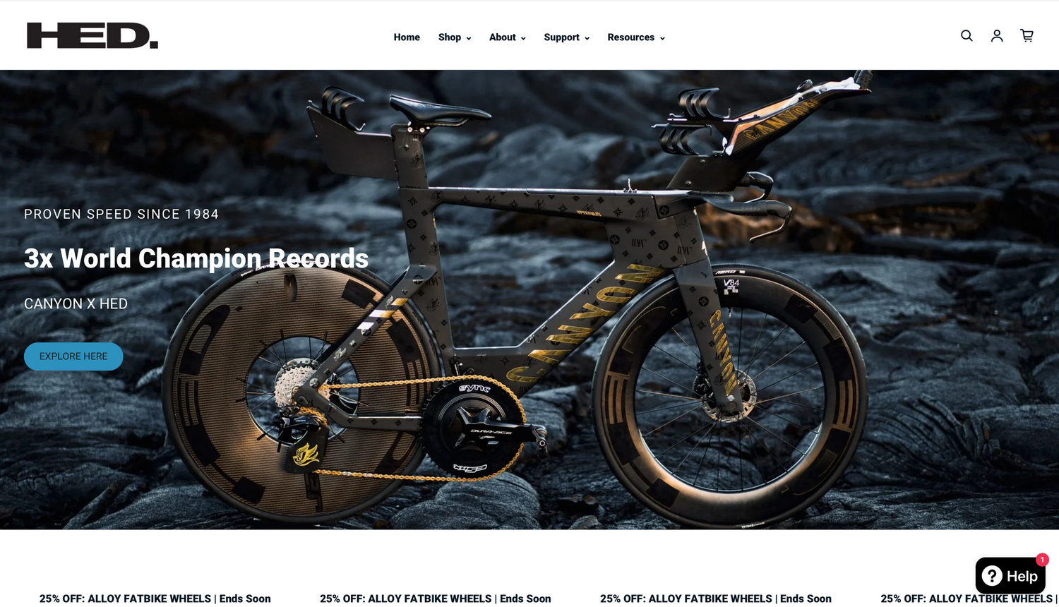 High-end triathlon bicycle with racing wheels displayed on rugged terrain with moody dark background.
