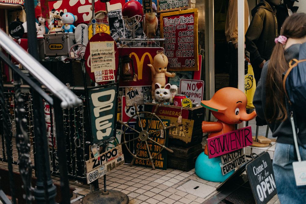 Colorful retail shop displaying anime merchandise and collectibles in Japan.