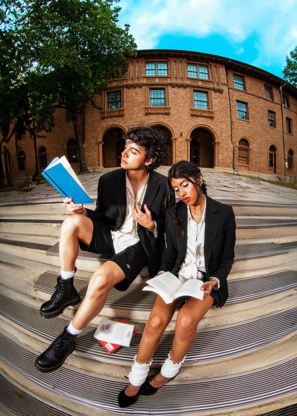 Creative wide-angle fashion photos taken on curved brick architecture.