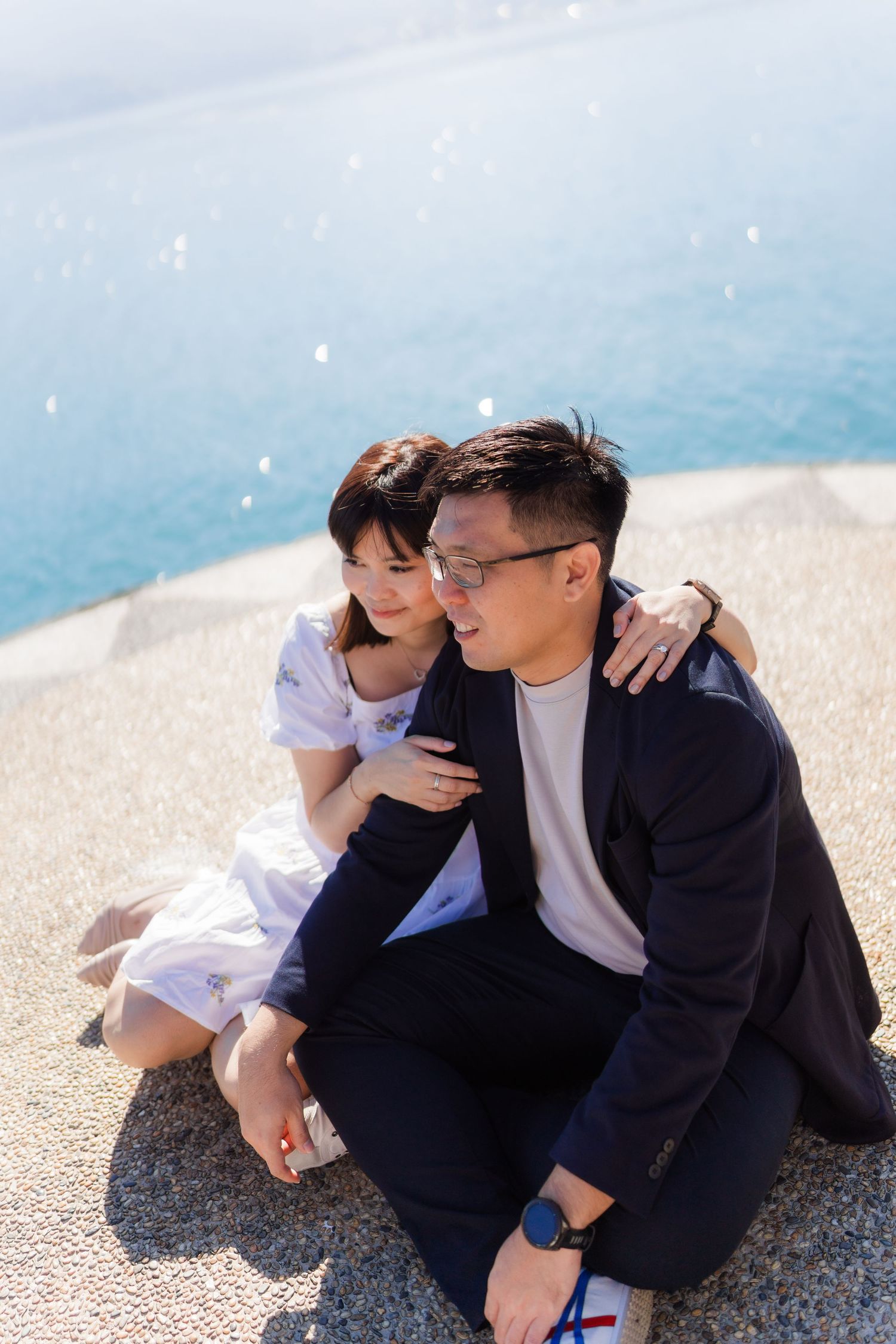 A romantic couple embraces and shares intimate moments in a sequence of candid photos.