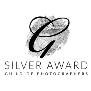 Professional photography award badge with "Silver Award" text and Guild of Photographers logo in grayscale design.