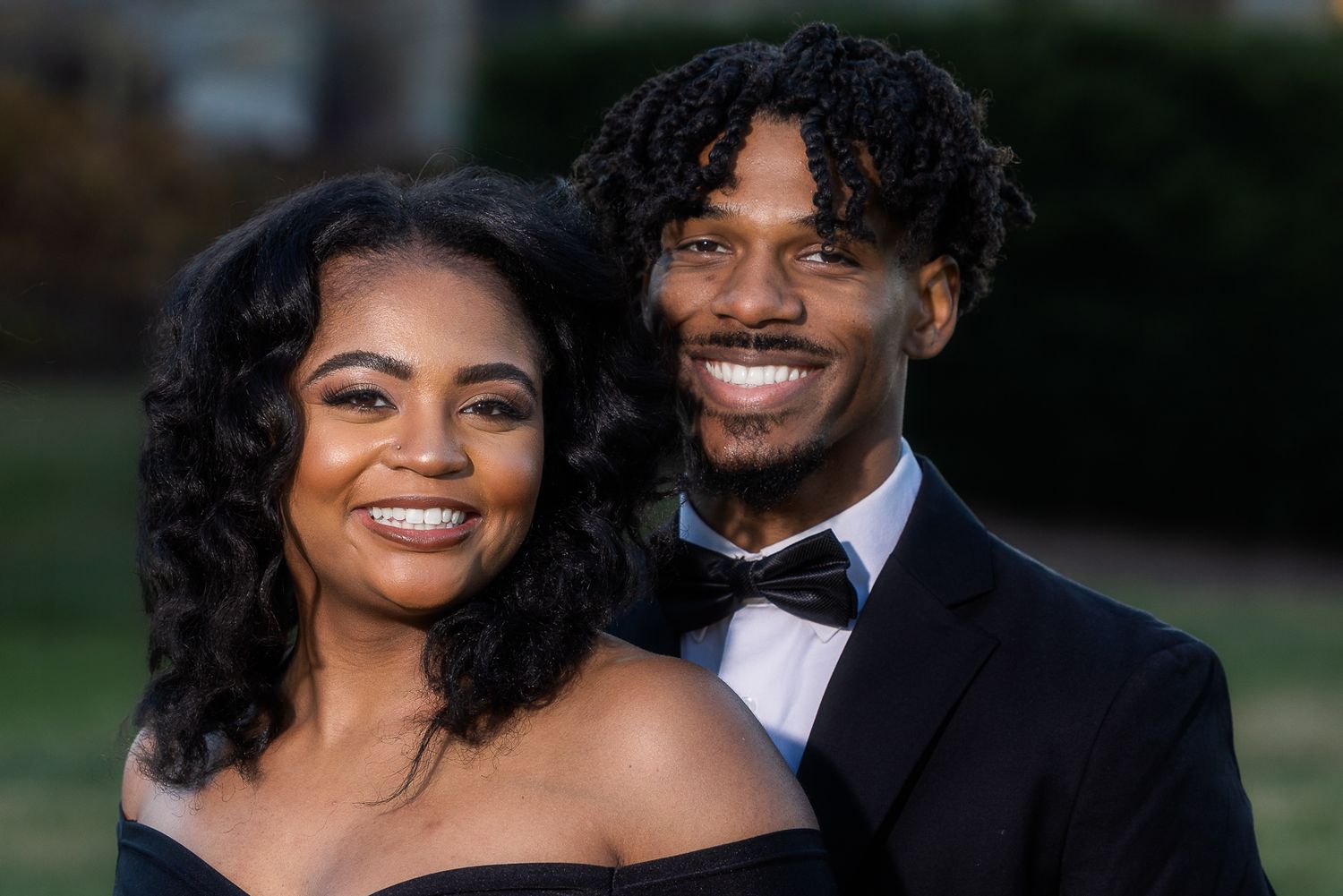 Frederick Maryland Wedding Photographer   - Elegant couple in black formal wear smile during outdoor portrait session.