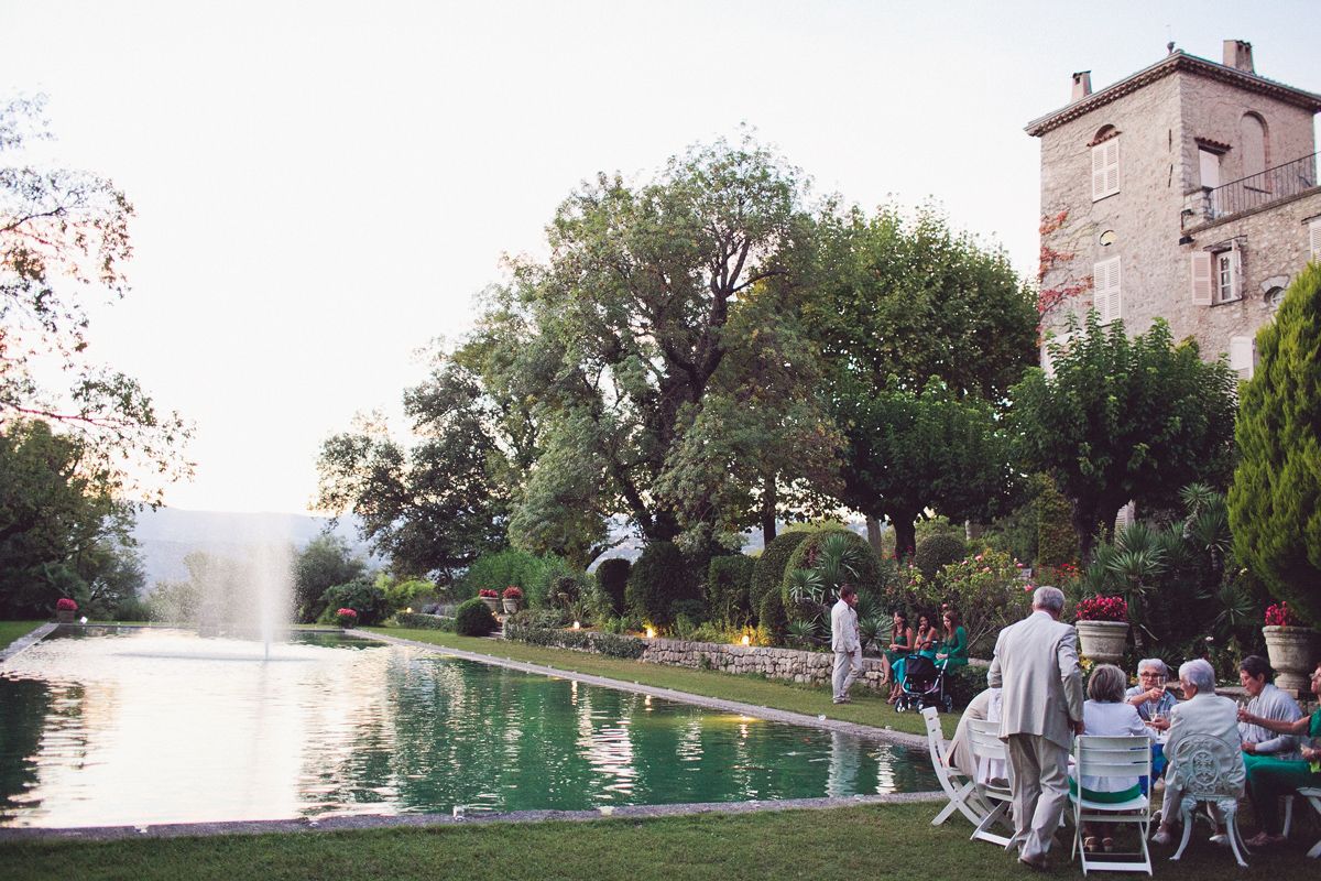 Destination wedding cocktail hour at a historic château estate in Provence, South of France