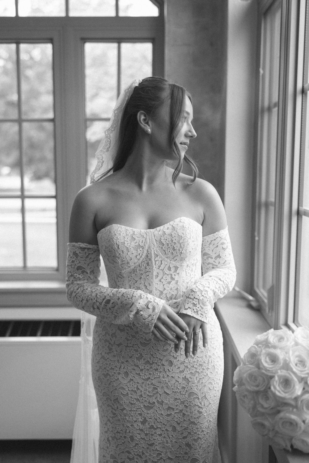 Black and white photo collage showing close-up details of a bride's lace wedding dress and bouquet near windows.