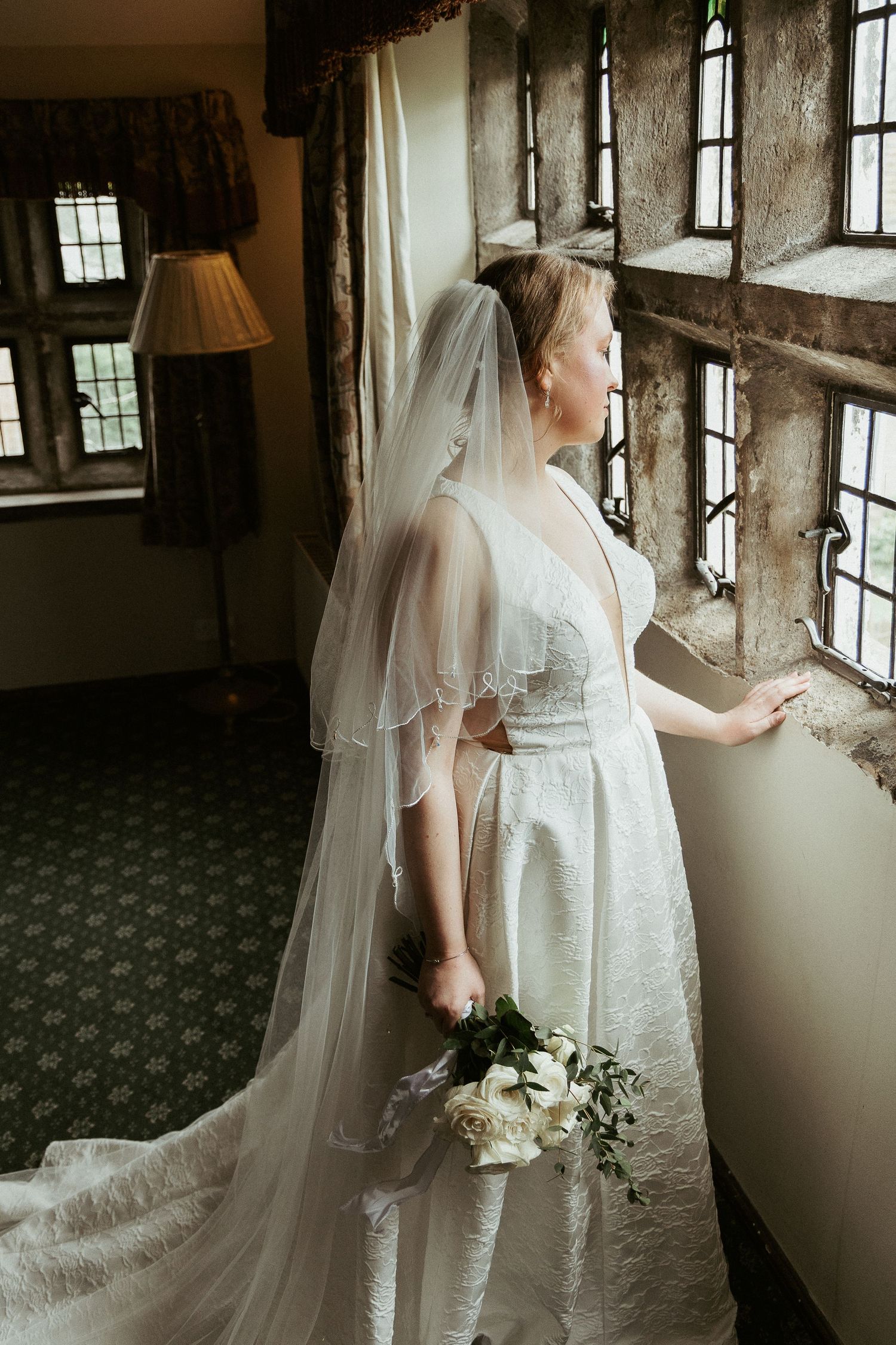 Bride moments before the ceremony at Holdsworth House Historic Wedding Venue, West Yorkshire