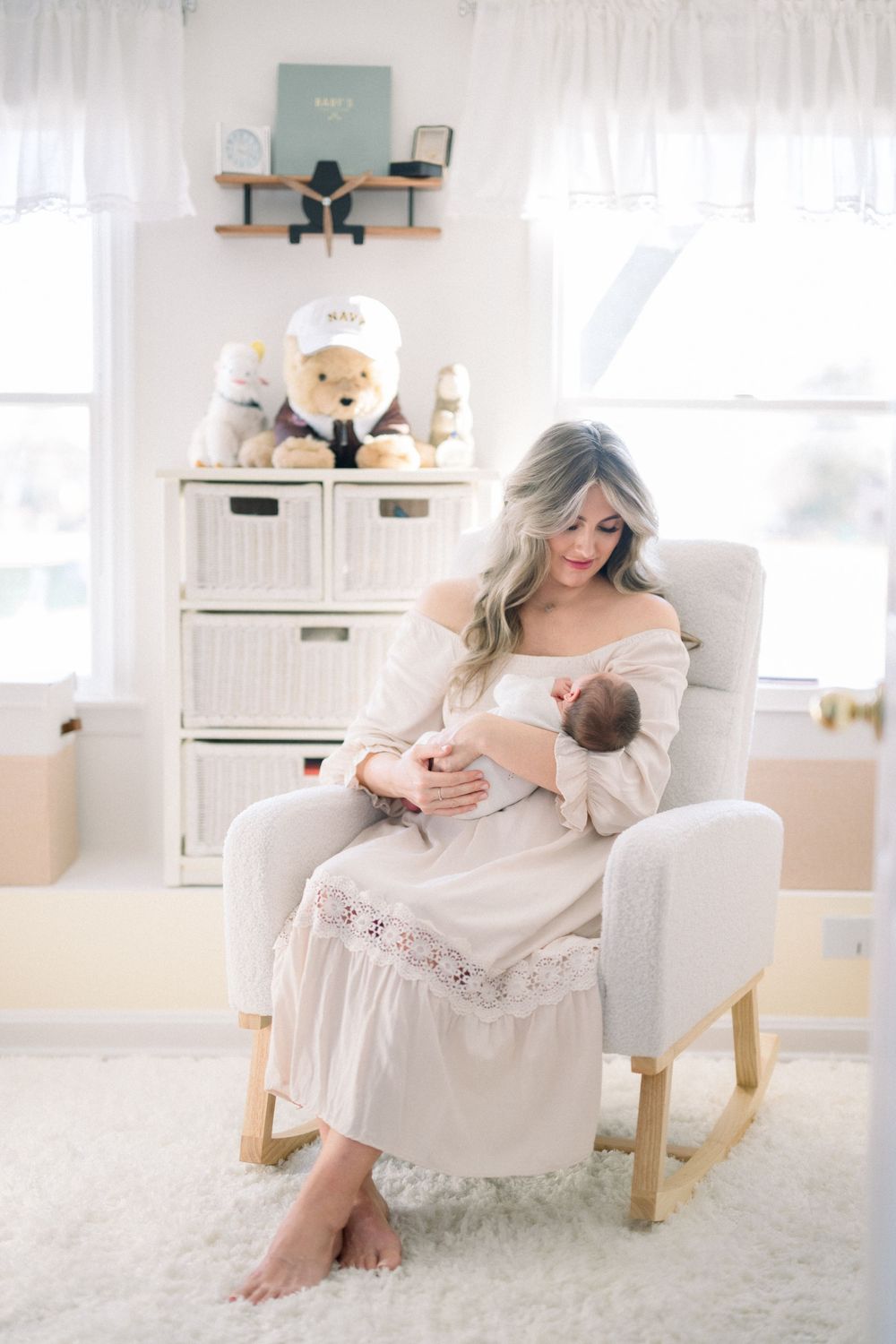 mother and baby in nursery during their newborn session in washington dc