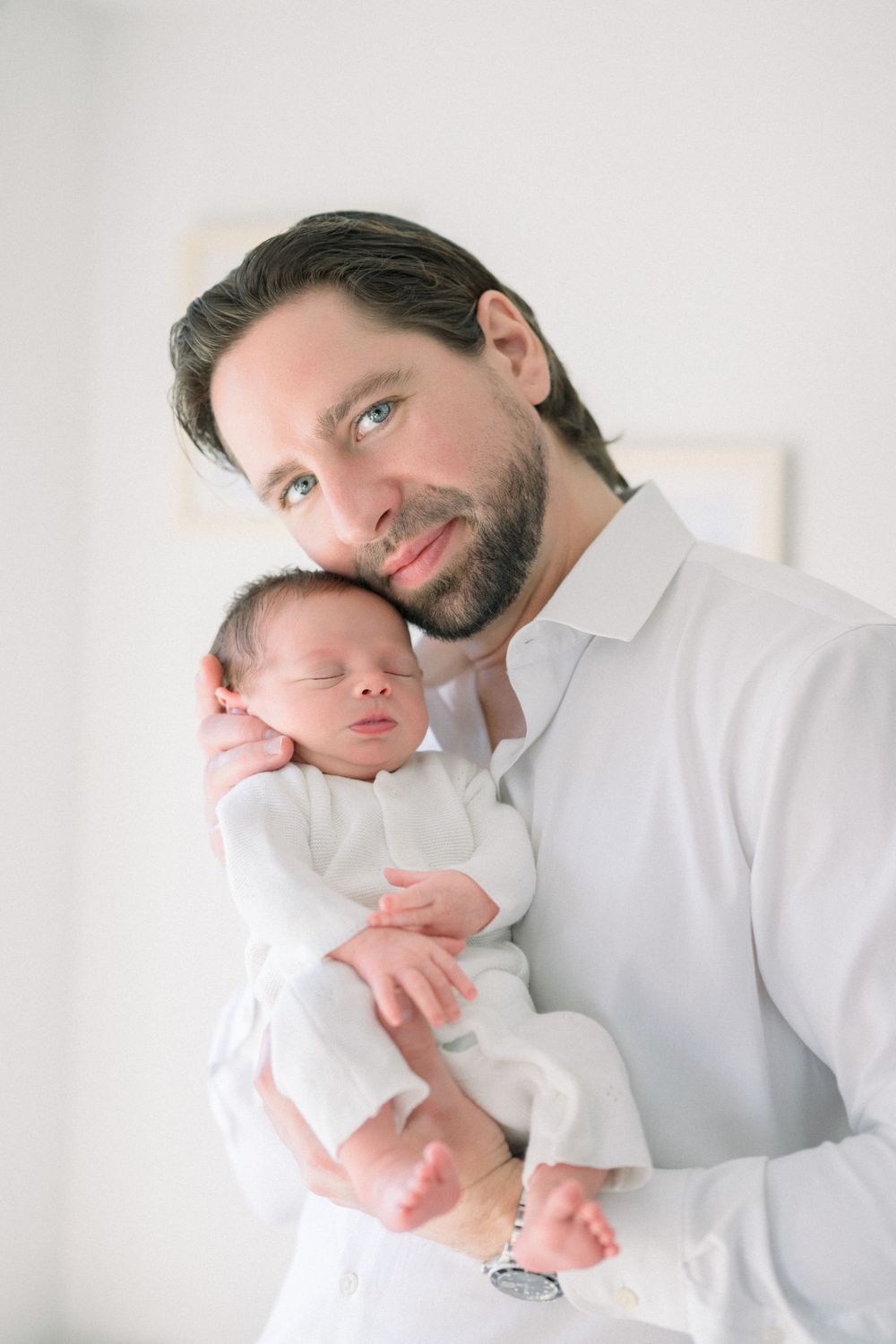 a father and newborn baby at their in-home session in northern virginia