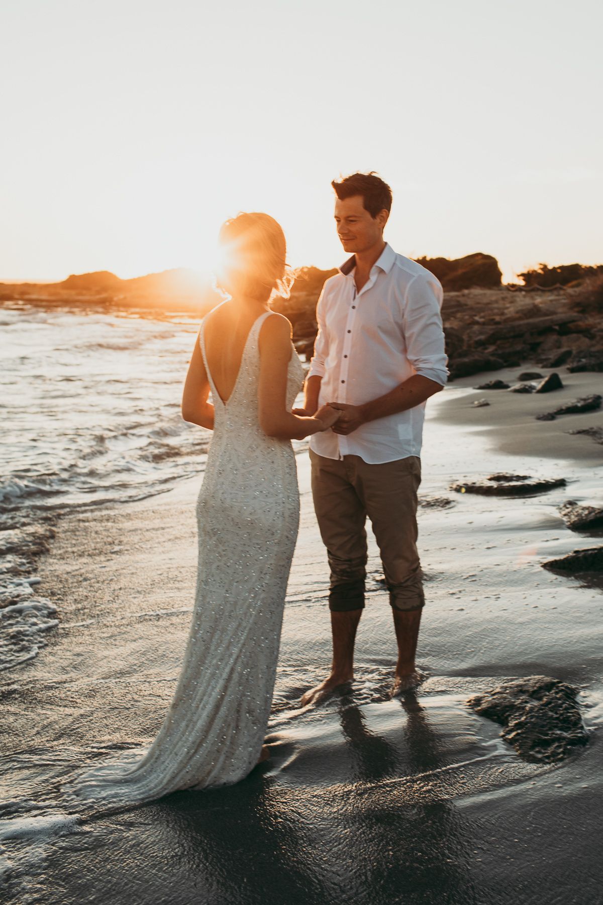 A couple in sunset light in Es Trenc, Mallorca