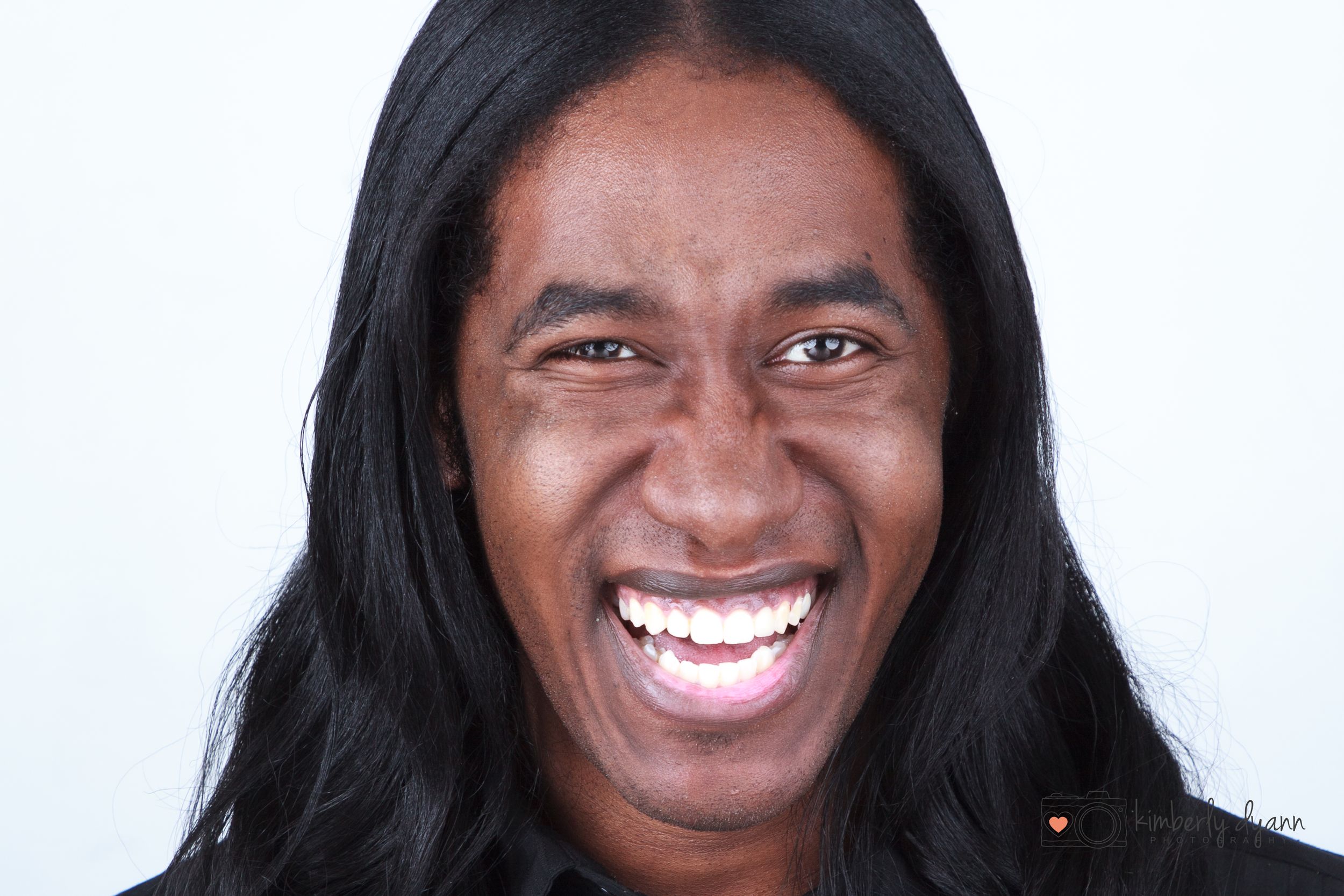 Series of candid expressions showing genuine laughter and joy against white background.
