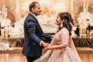 Couple sharing an intimate dance moment at their wedding reception.