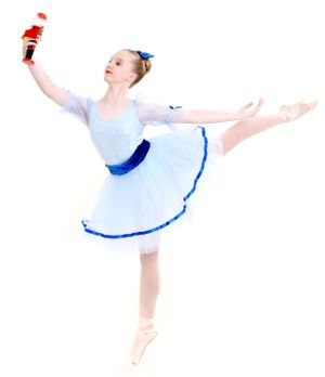Ballerina on pointe in arabesque