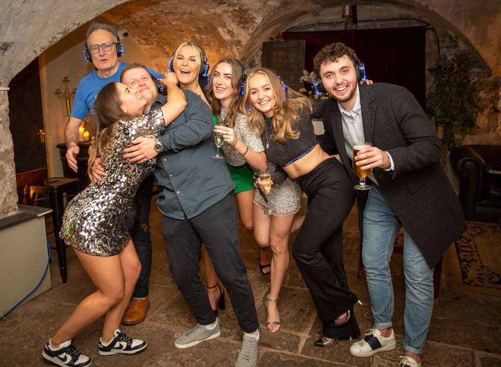 Silent disco. party guests. Group shot.