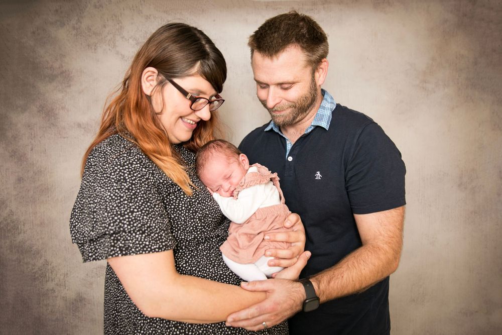 Parents with their Newborn daughter.