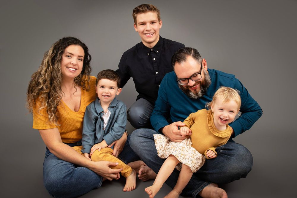 Family photo. Studio shot.