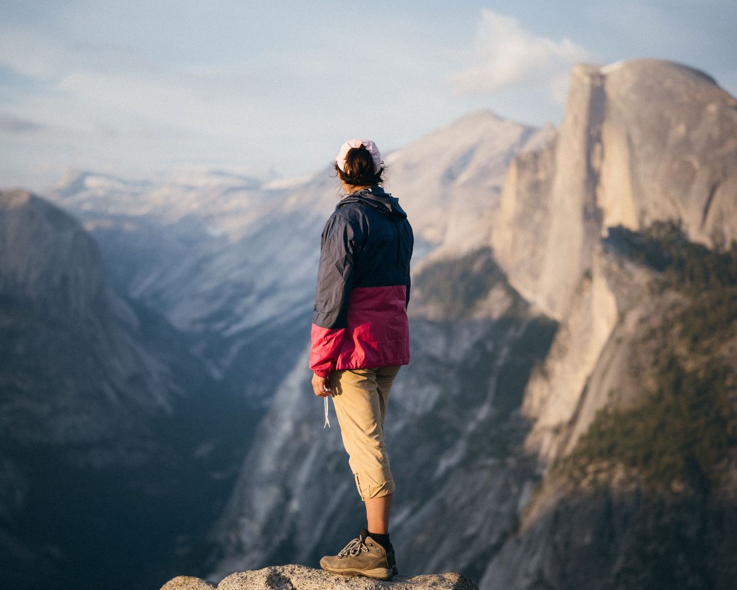 Founder standing looking out at Half Dome in Yosemite National Park