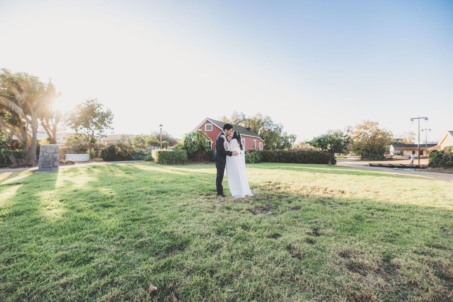 A vibrant wedding scene captured by Hernandez Studios, showcasing a bride and groom sharing a joyful moment.”
