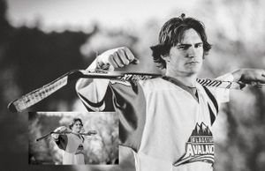 Dramatic black and white sports portrait with vintage uniform and equipment.