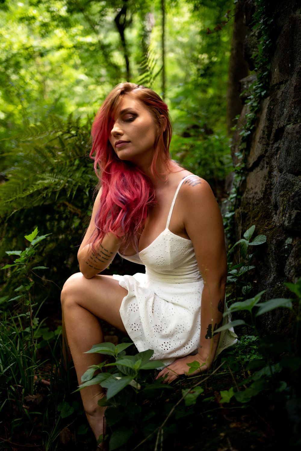 outdoor portrait of woman by creek, empowering session