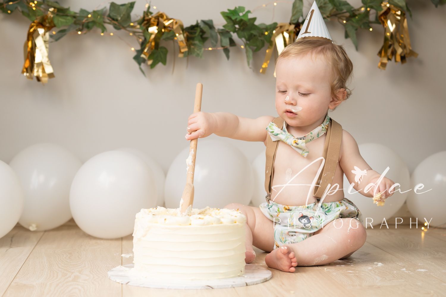 cake smash photography melbourne western suburbs minimalist theme white green studio baby first birthday gift