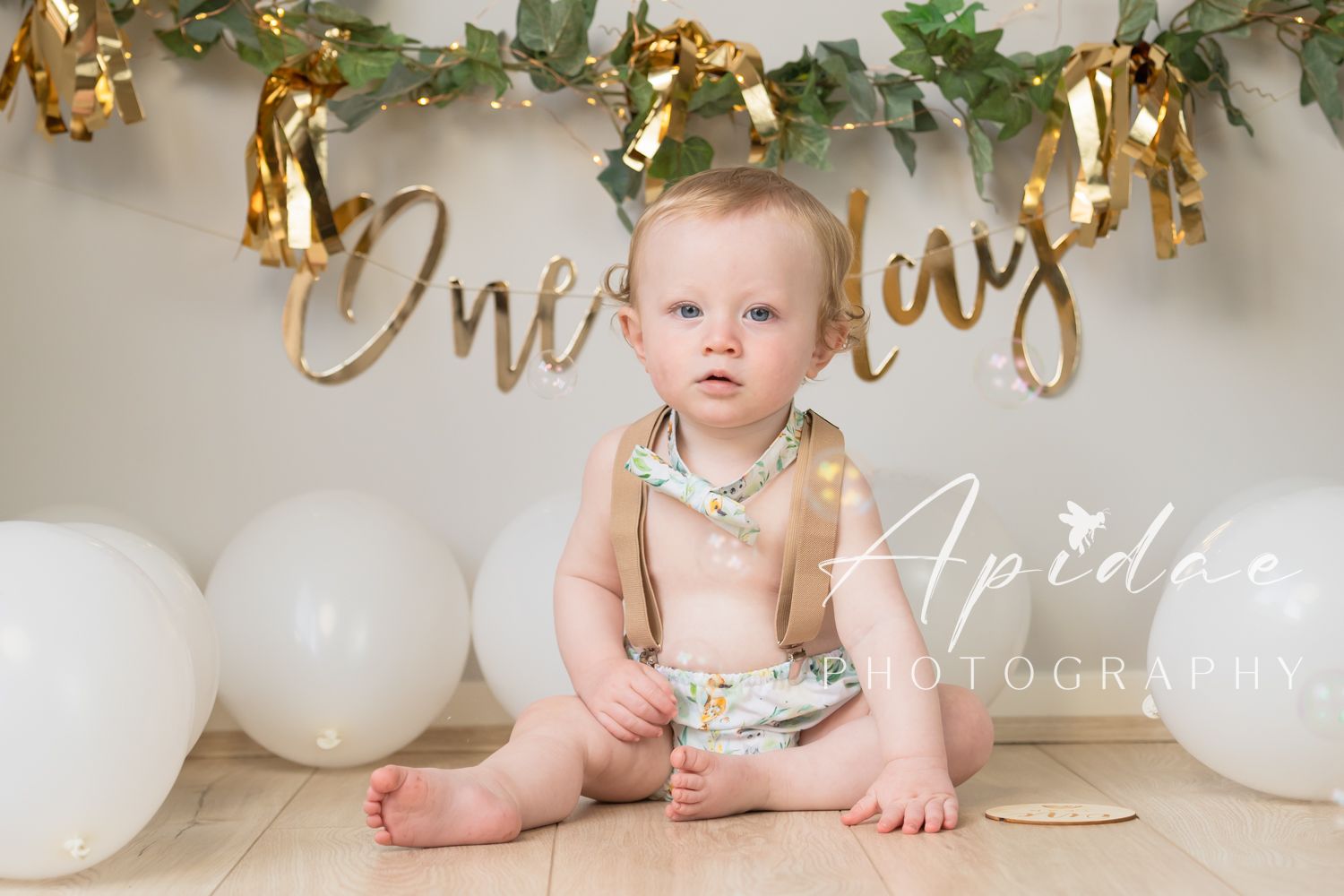 cake smash photography melbourne western suburbs minimalist theme white green studio baby first birthday gift