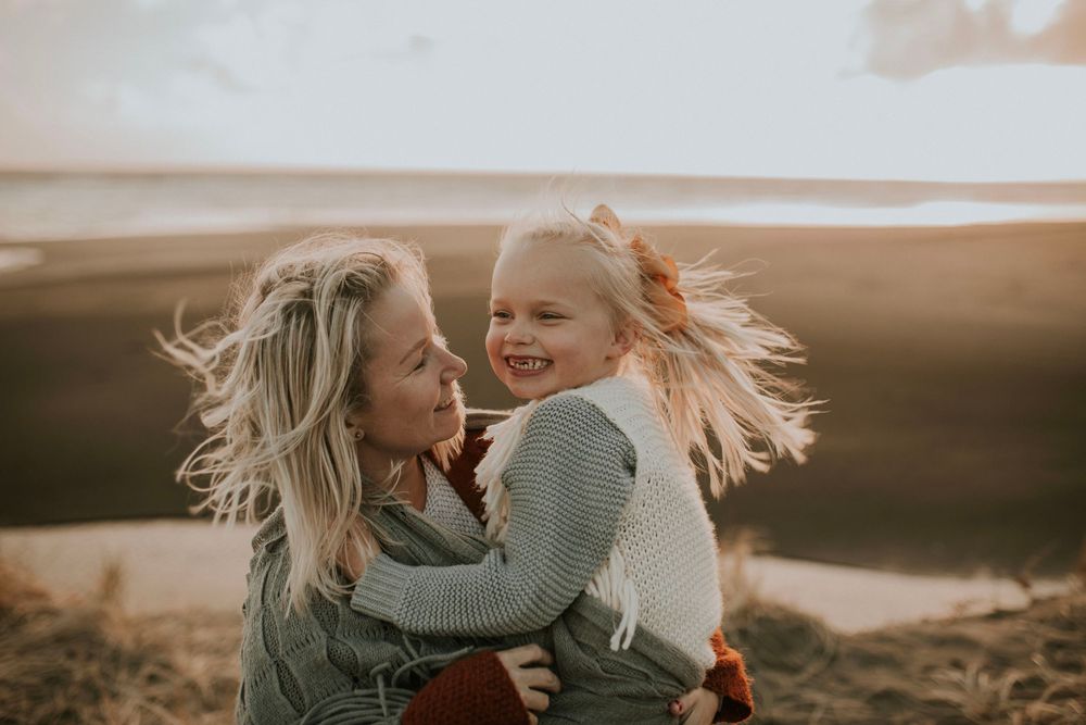 sunset at piha amongst the dunes with my toothless girl
