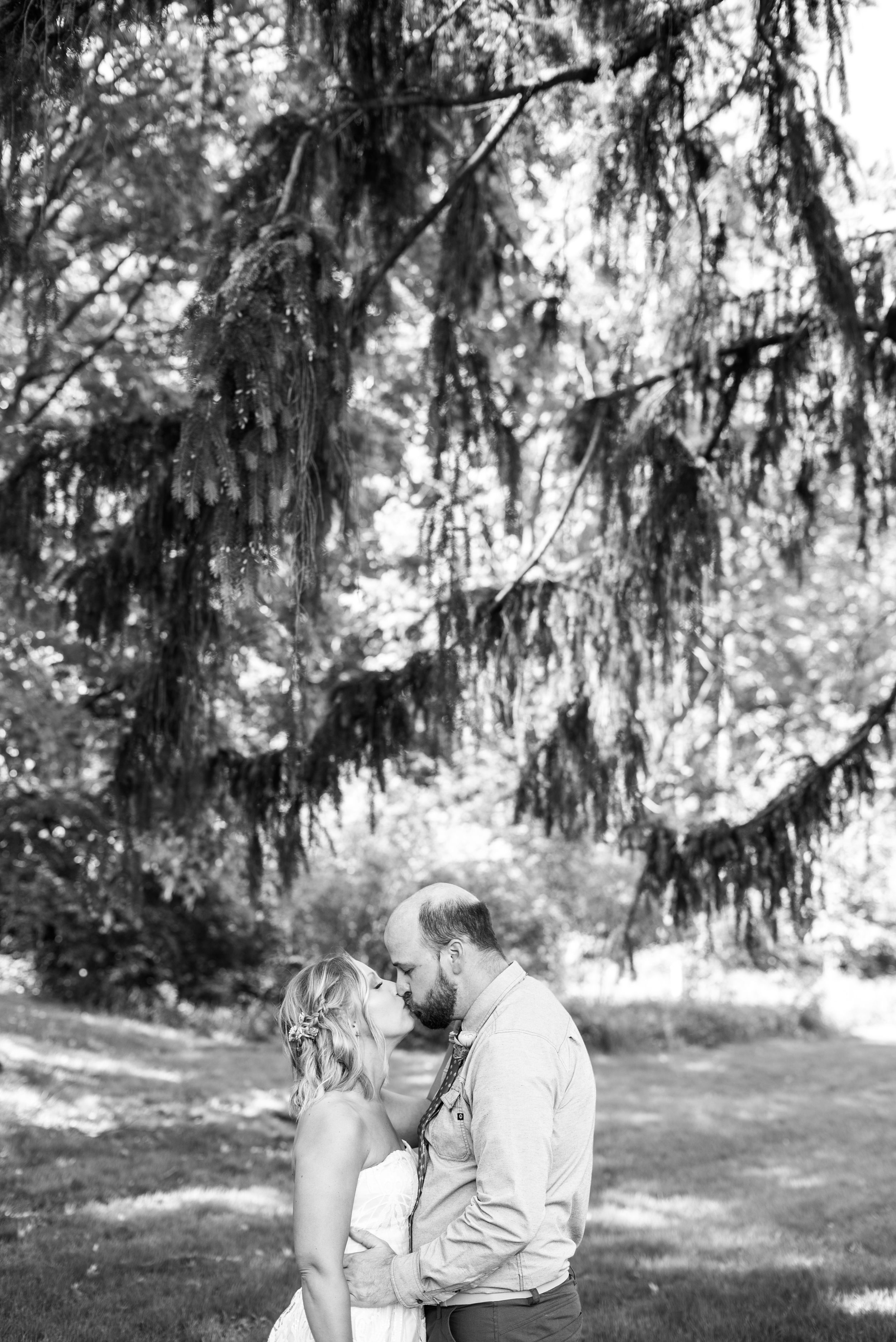 First Look Photos Bride and Groom. Downtown Grand Rapids Wedding Portraits. John Ball Zoo Weddings. Wedding Photography.