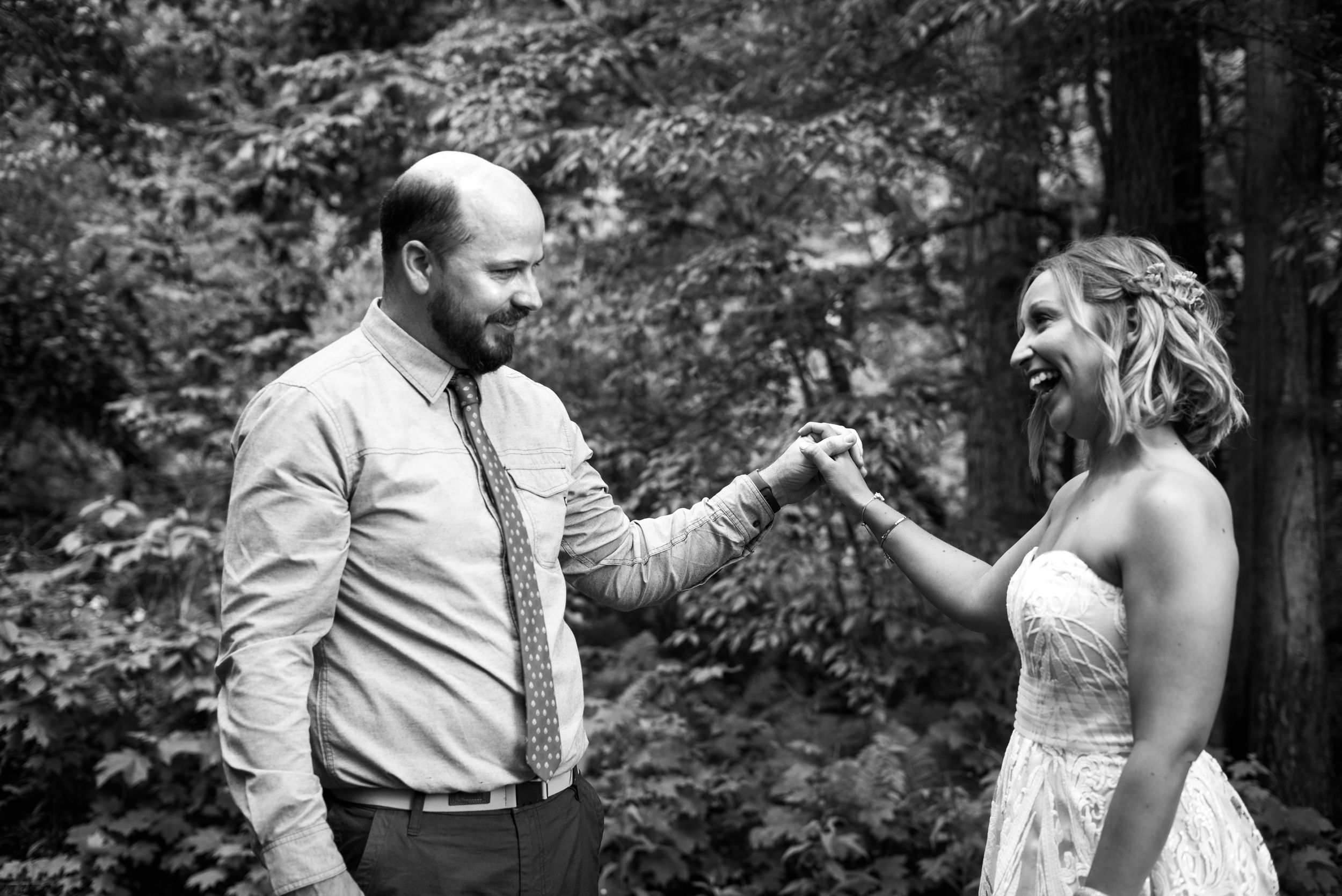 First Look Photos Bride and Groom. Downtown Grand Rapids Wedding Portraits. John Ball Zoo Weddings. Wedding Photography.