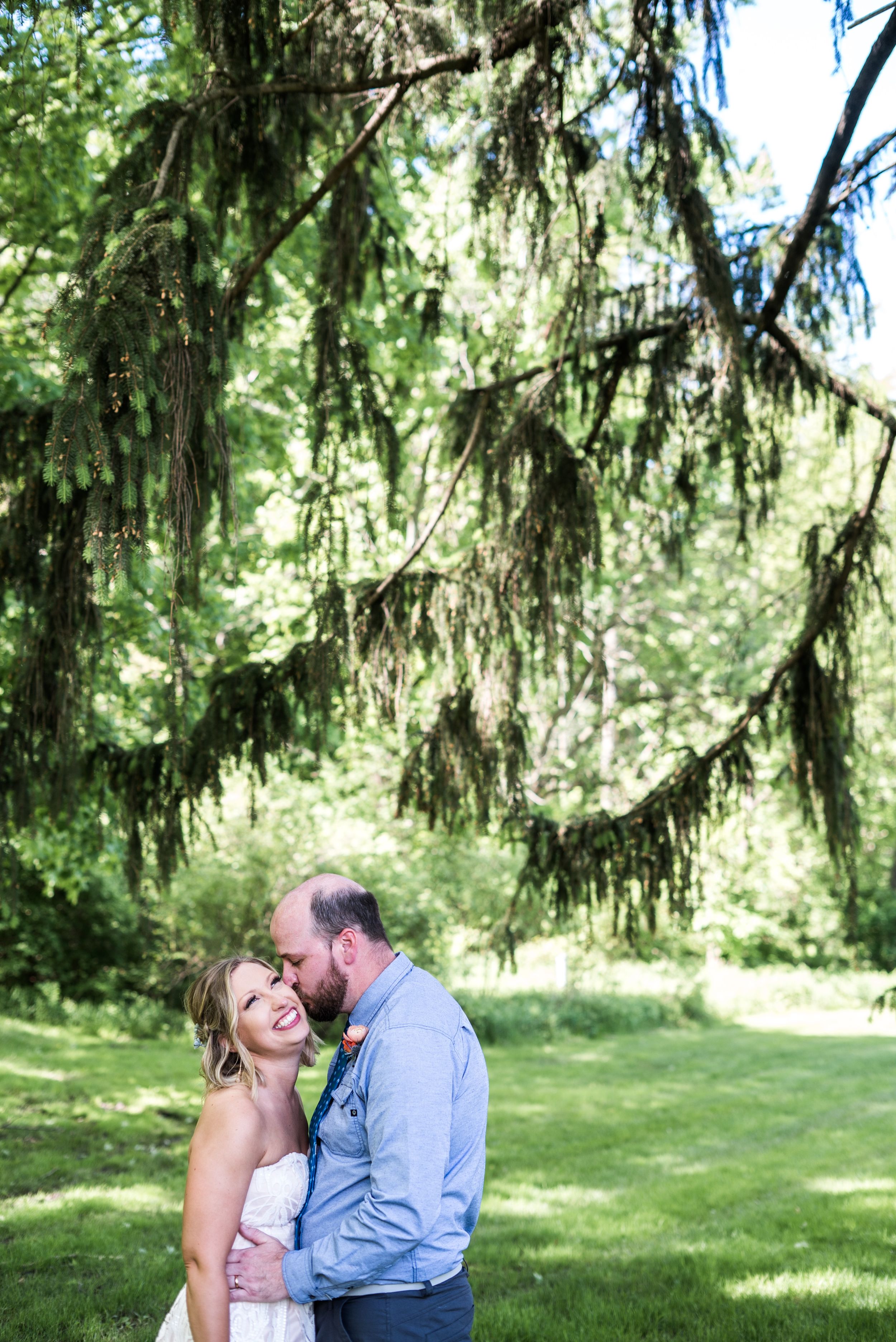 First Look Photos Bride and Groom. Downtown Grand Rapids Wedding Portraits. John Ball Zoo Weddings. Wedding Photography.