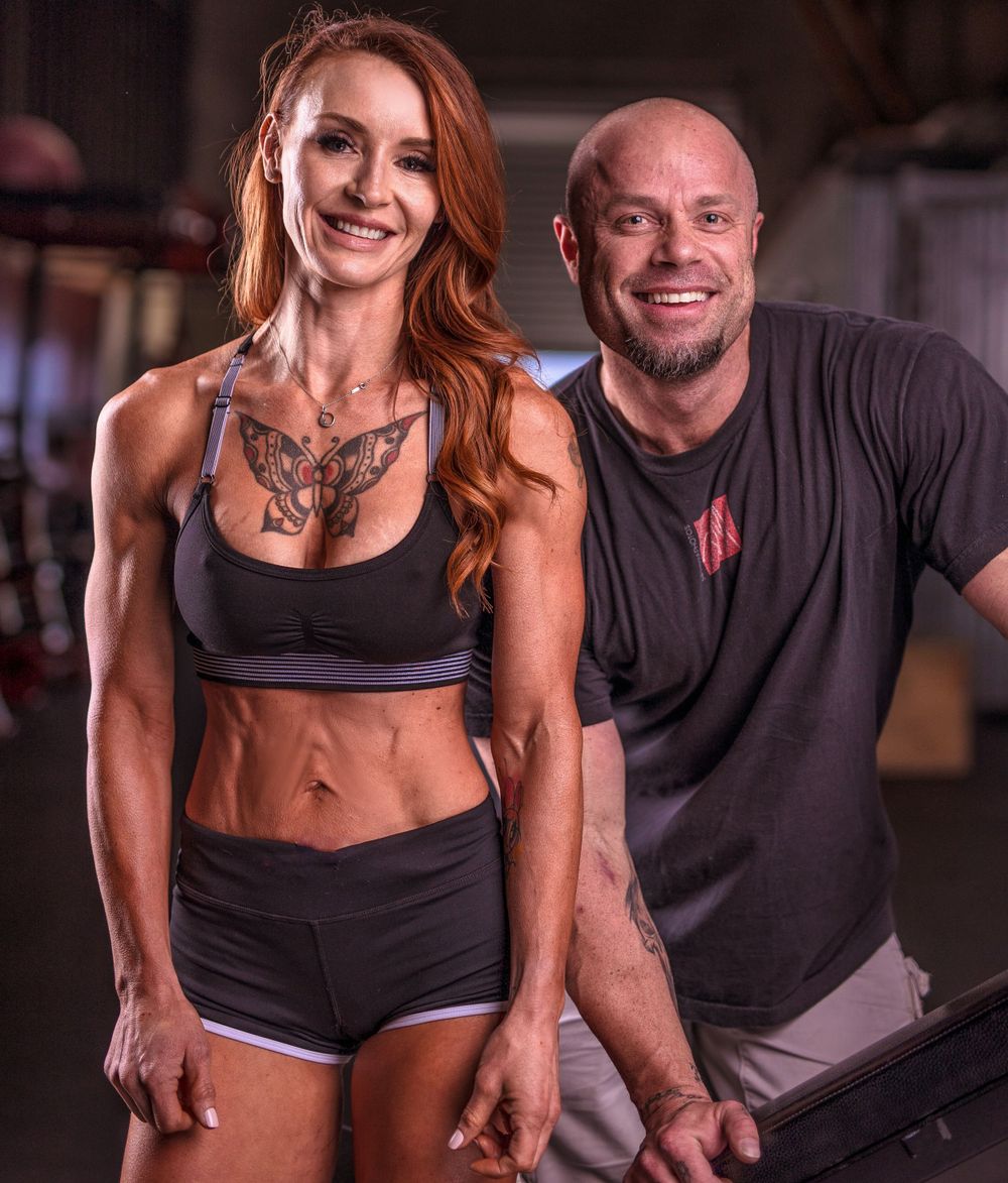 Fitness enthusiasts showing off athletic physiques in gym workout setting.