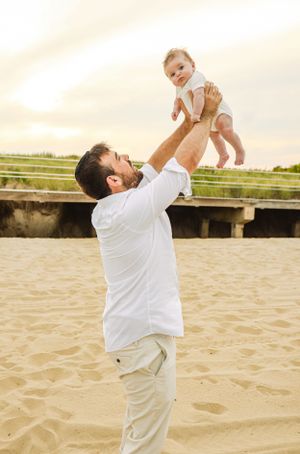 Sunset photo of a daddy and his little baby boy.