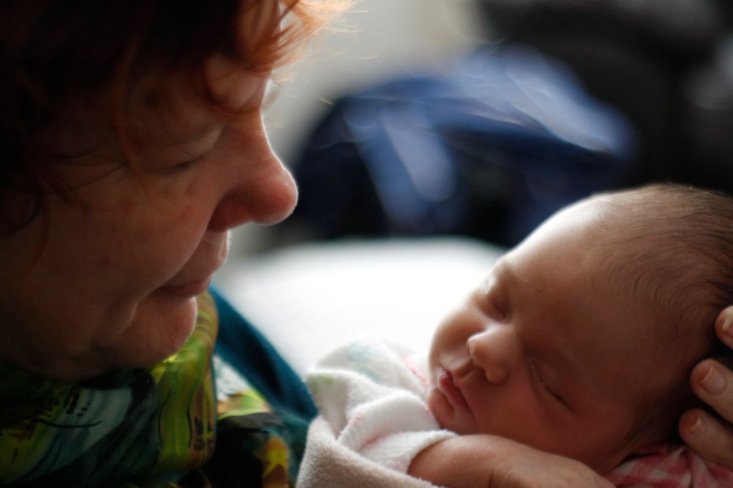 grandmother with newborn baby
