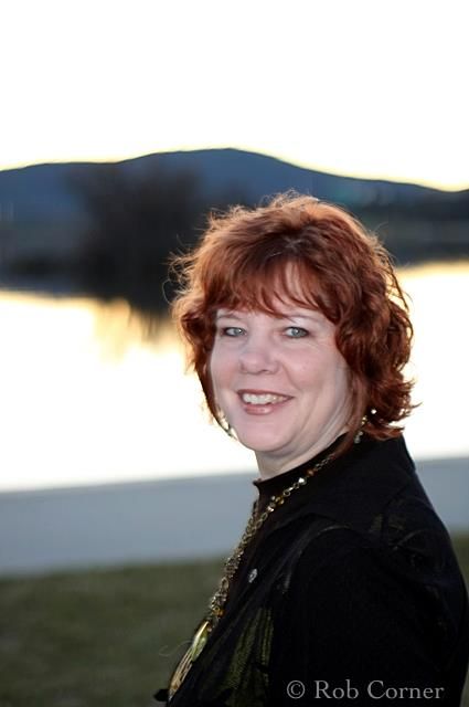 Redhead portrait by lake