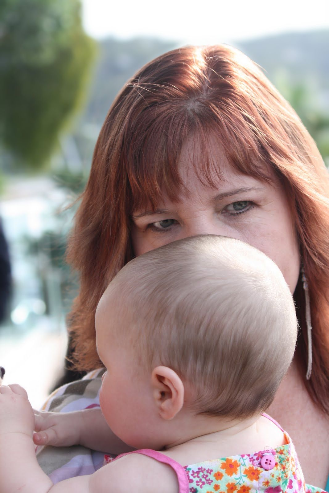 redhead woman with baby