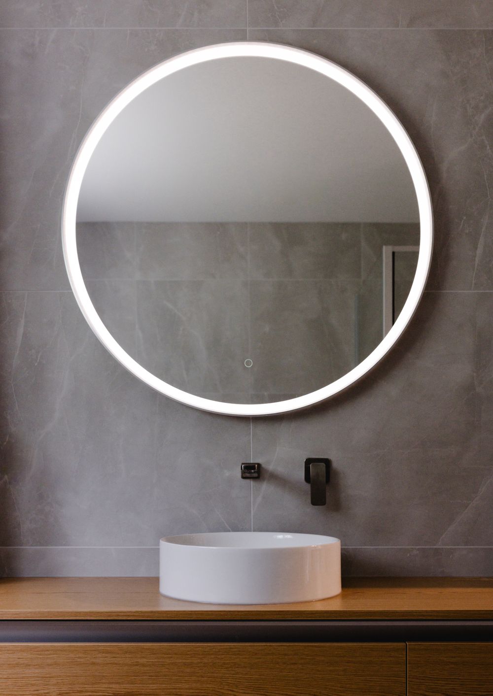 A minimalist bathroom in a modern home, detail shot of sink, taken by Wellington commercial spaces photographer