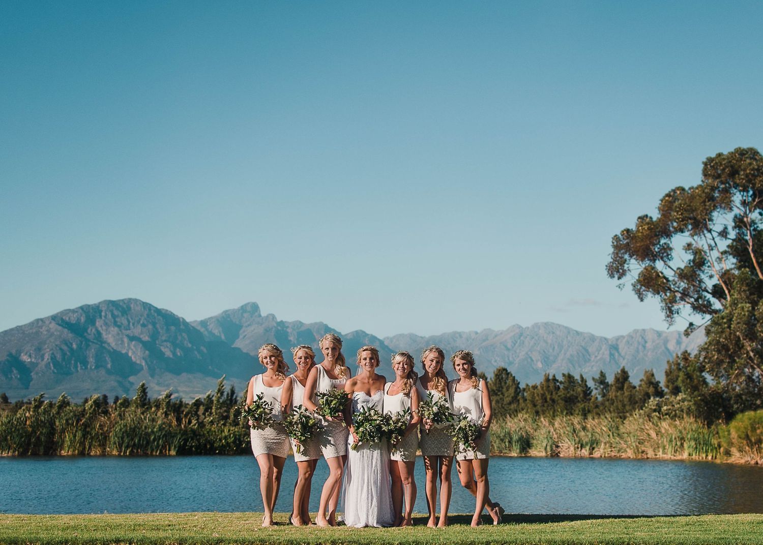 Bride with her bridal party in front of the dam