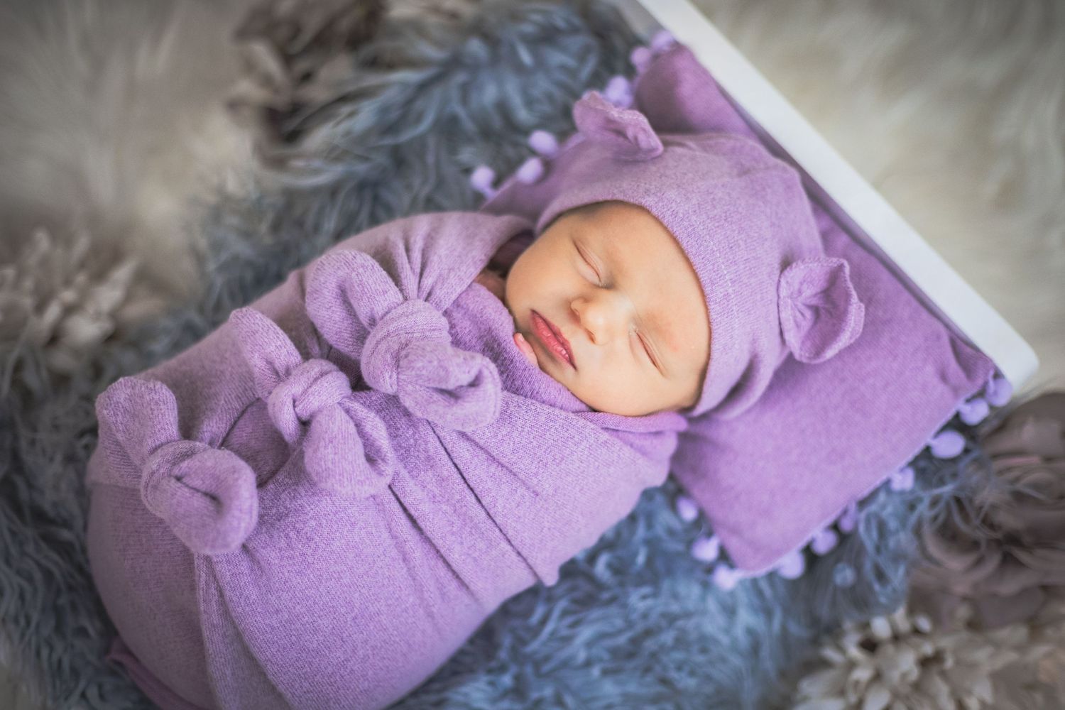 Aesthetically pleasing baby sleeping on doll bed